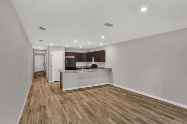 Open first floor looking toward the kitchen